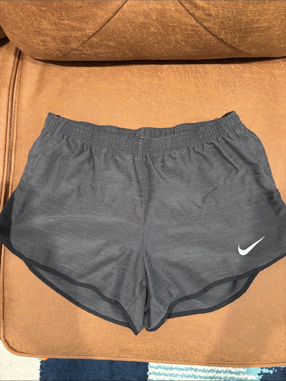 Nike Women's Dark Gray Athletic Shorts with White Swoosh